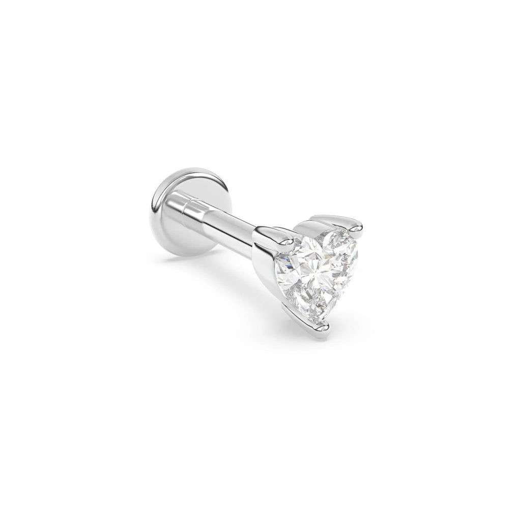 diamond stud earring handmade with a heart shaped diamond set in 14k solid gold